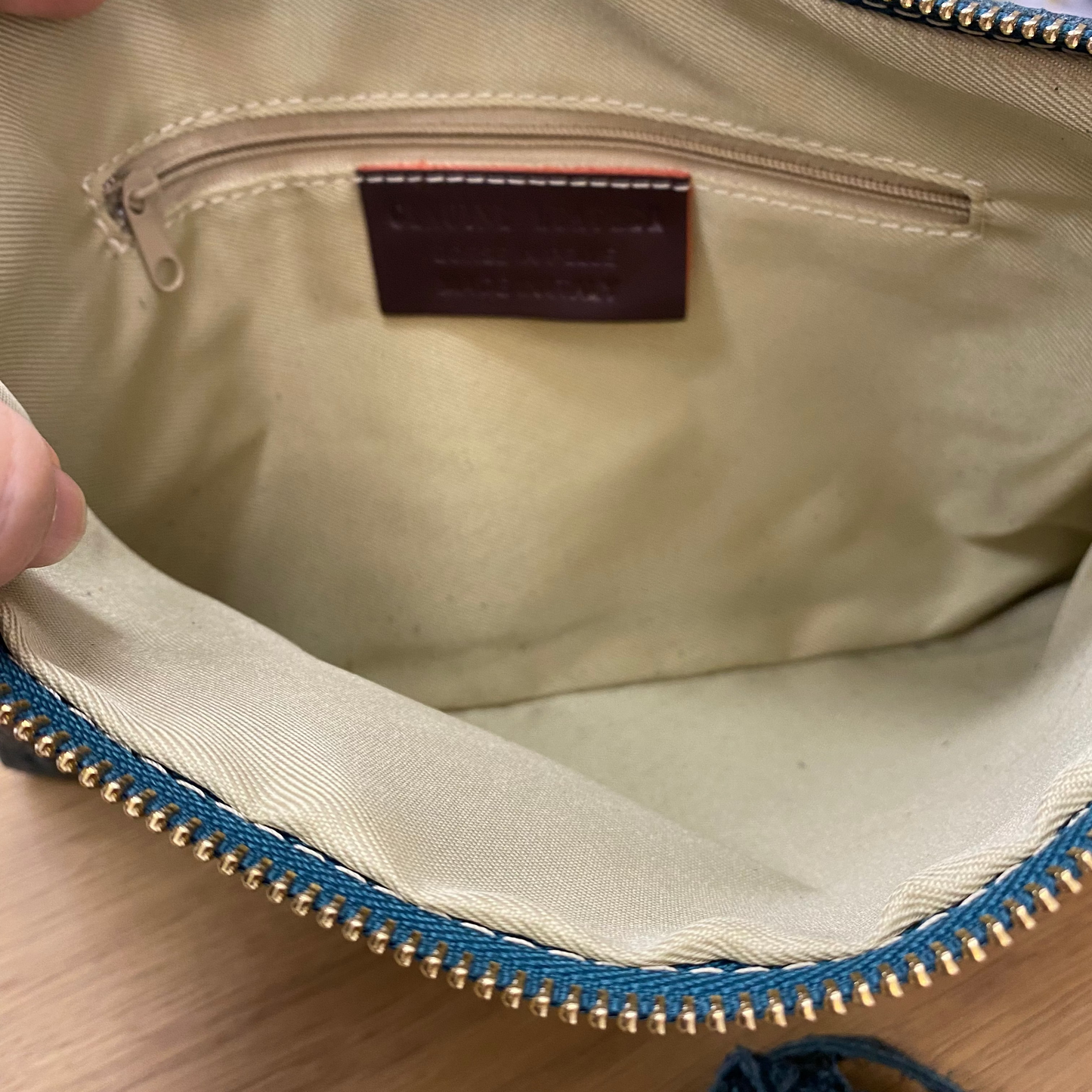 Bolso bandolera de piel 100% vacuno trenzado color verde azulado