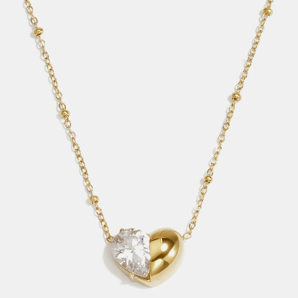 Collar de acero con esferas y dije de corazón mitad circonita en acabado oro - Moments by You