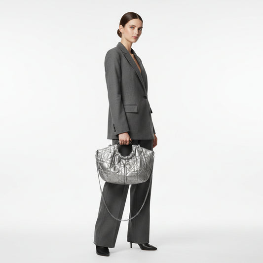 Bolso circular de asa metálica guateado acabado plata