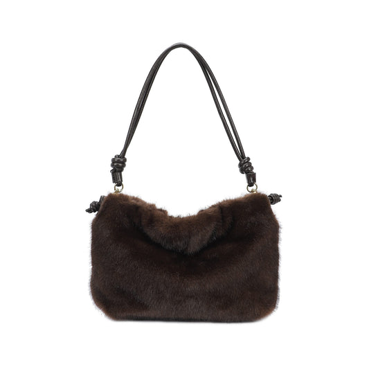 Bolso de hombro y bandolera en formato saco con pelo en color marrón chocolate - mbyou