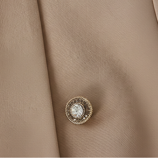 Broche pequeño y redondo con circonitas en diferentes colores y un acabado oro - Moments by You