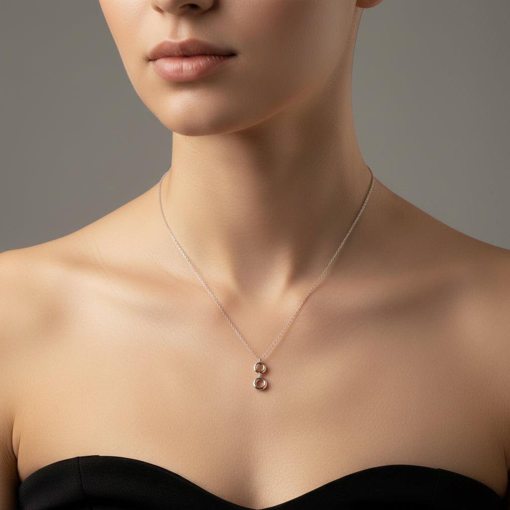 Collar de acero inoxidable con colgante de dos altura con forma de aros