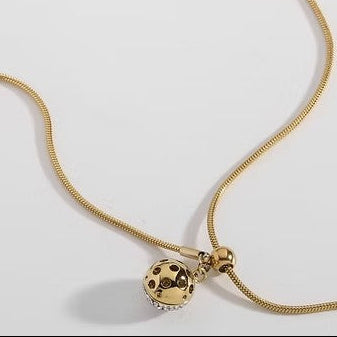 Collar de acero ajustable con dije esférico con circonitas acabado oro - Moments by You