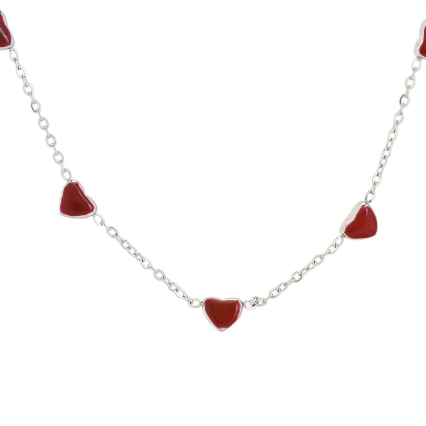 Collar en acero inoxidable con corazones rojos acabado plata