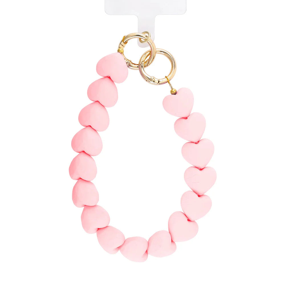 Correa para sujetar el móvil de corazones rosas