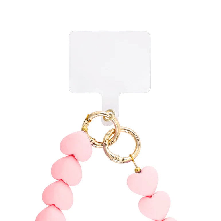 Correa para sujetar el móvil de corazones rosas