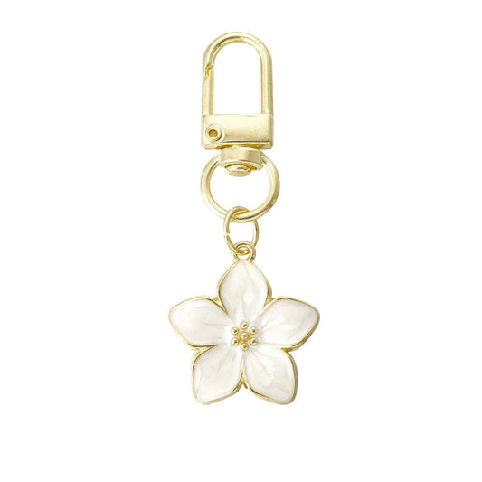 Llavero de flor de esmalte en blanco y aleación con acabado oro - mbyou
