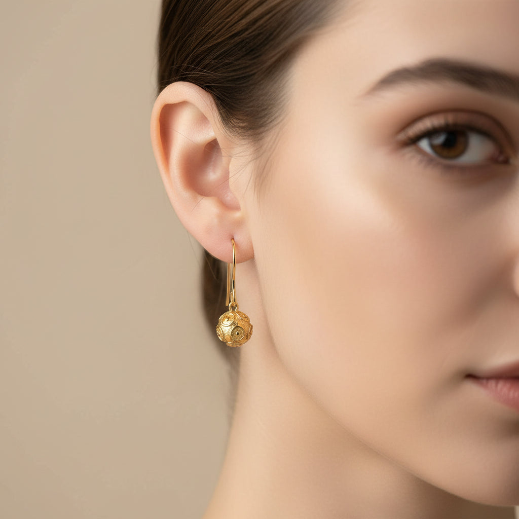 Pendientes largos de acero con esfera y diseño de circunferencias oro - Moments by You