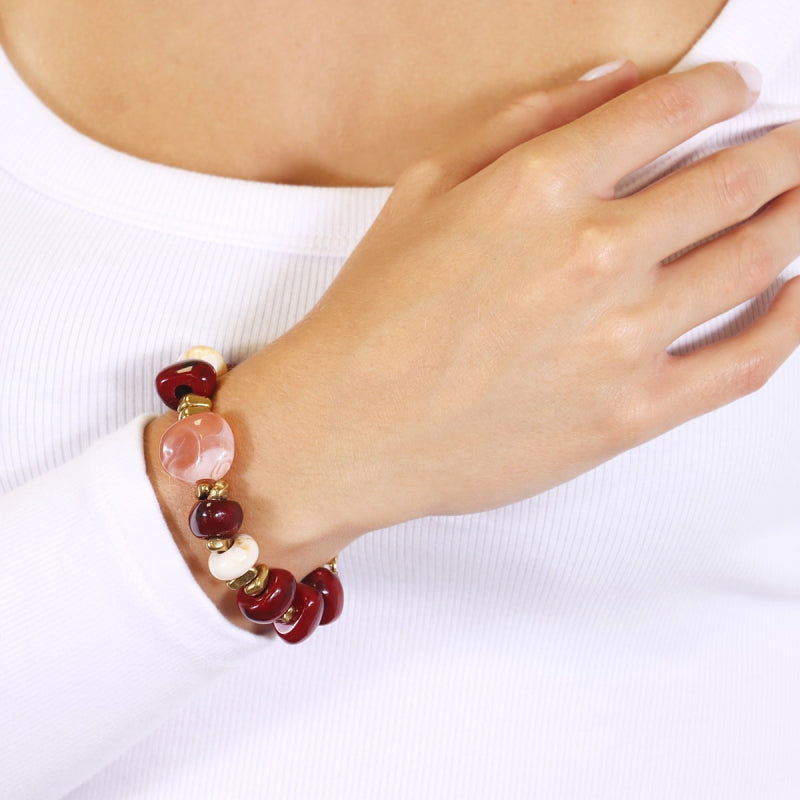 Pulsera de acero quirúrgico con piedras de resina en burdeos y rosa acabado oro - Moments by You