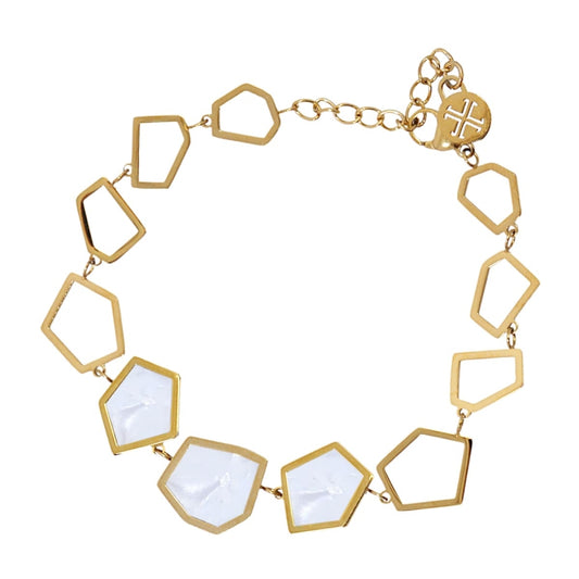 Pulsera de acero quirúrgico con formas geométricas y tres con acabado mármol en color blanco acabado oro - mbyou