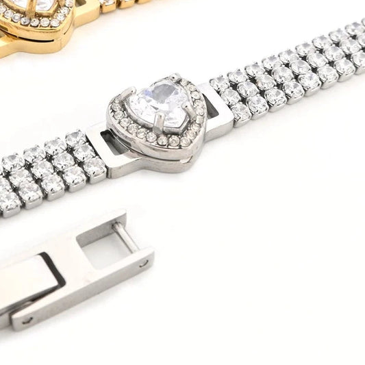 Pulsera de malla, de acero inoxidable con circonitas  y un corazón acabado plata- mbyou