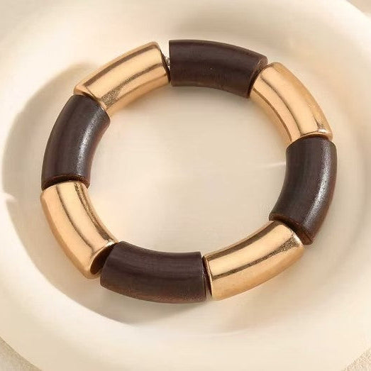 Pulsera de acero y madera con formas geométricas en dorado y chocolate - Moments by You