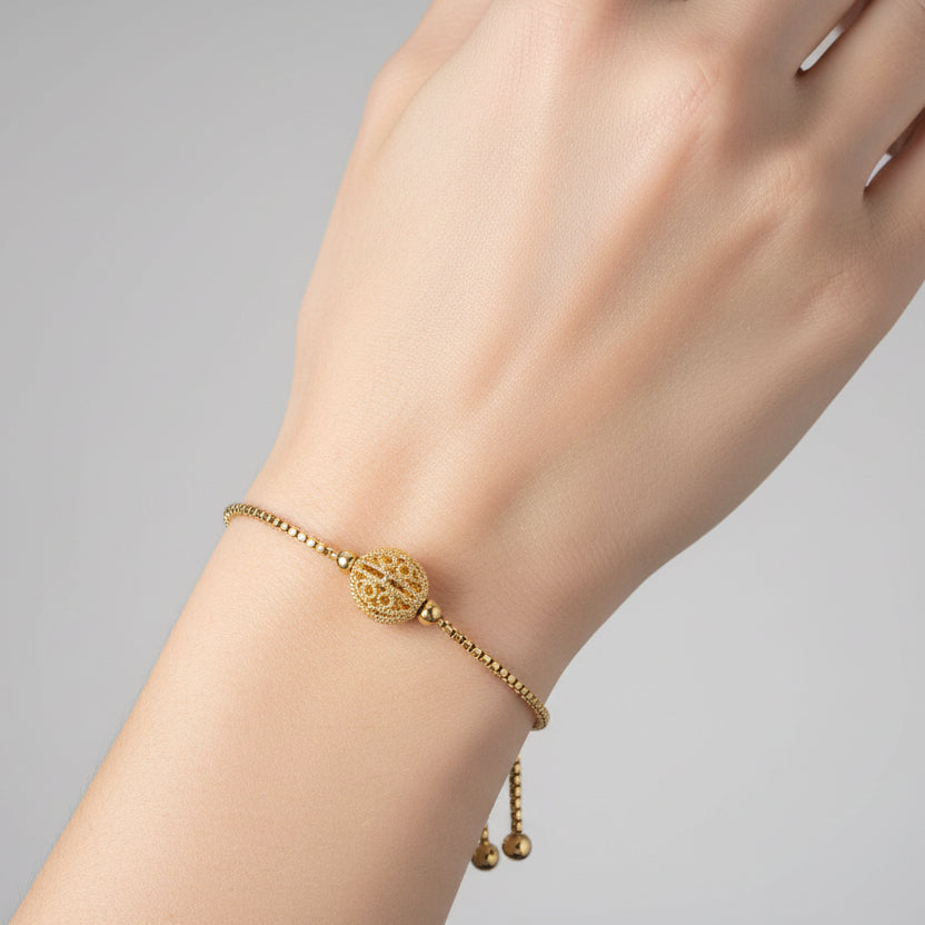 Pulsera de acero con esfera de filigrana y cierre regulable oro - Moments by You