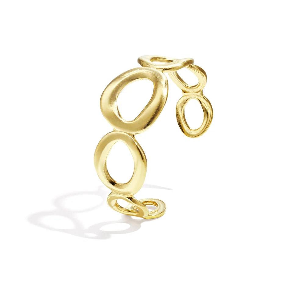 Rigid steel bracelet with silver clovers