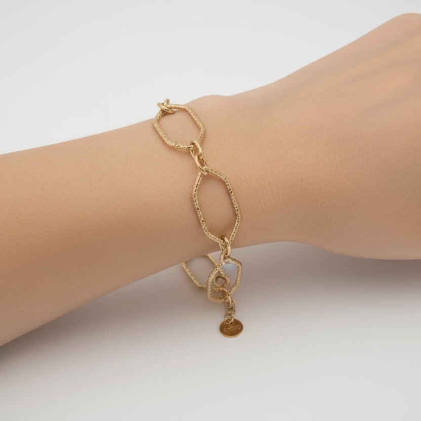 Pulsera de acero fina de formas geométricas con textura rugosa acabado oro - Moments by You