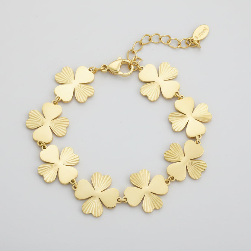 Pulsera de acero inoxidable con tréboles en acabado oro y con estampado - Moments by You