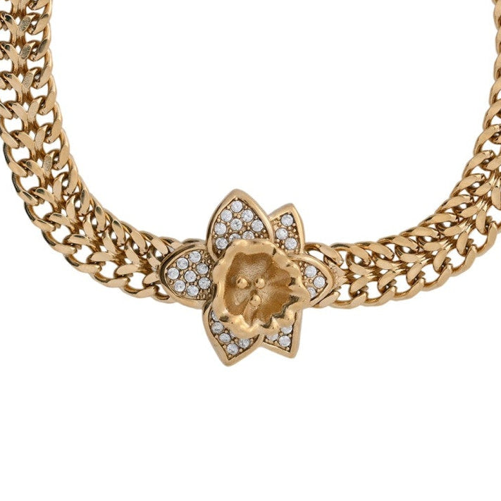 Pulsera de acero con malla y flor de Lis de circonitas acabado oro