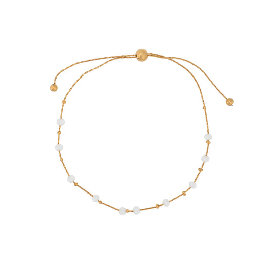 Pulsera fina de acero inoxidable con piedras de color blanco y ajustable acabada oro - mbyou