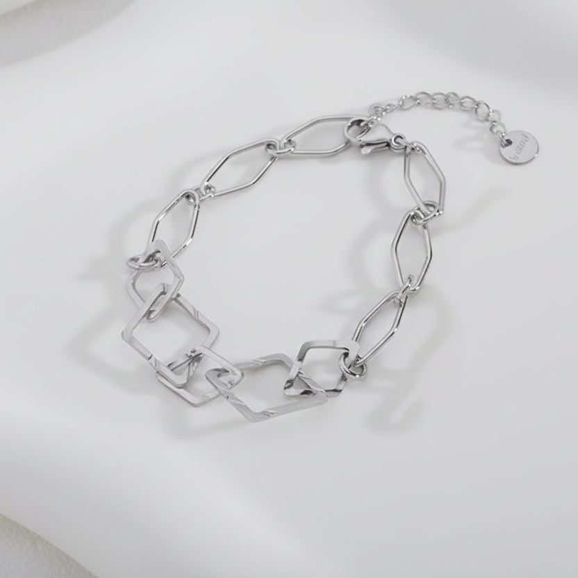 Pulsera de acero formas geométricas de diferentes tamaños - Moments by You