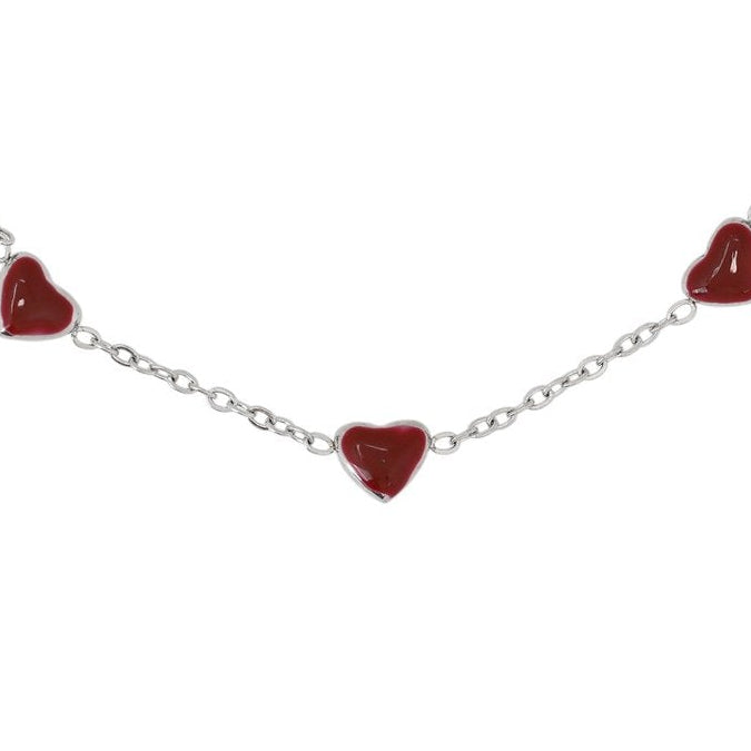 Pulsera con corazones rojos esmaltados acabado plata