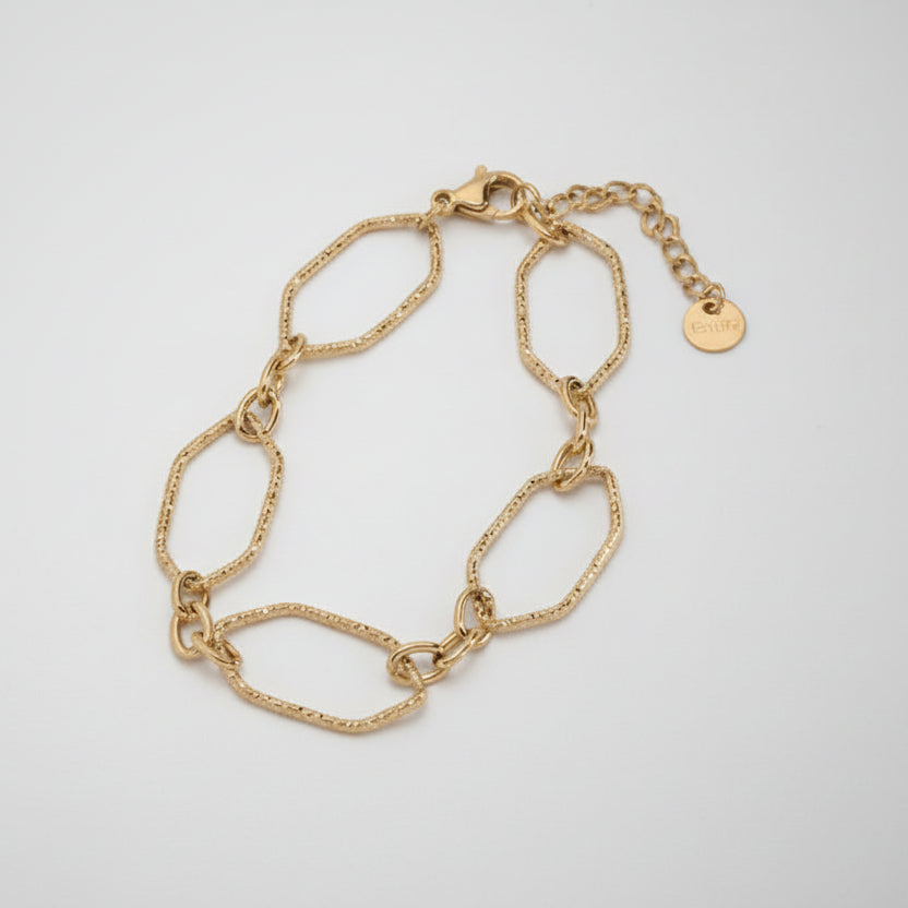 Pulsera de acero fina de formas geométricas con textura rugosa acabado oro - Moments by You