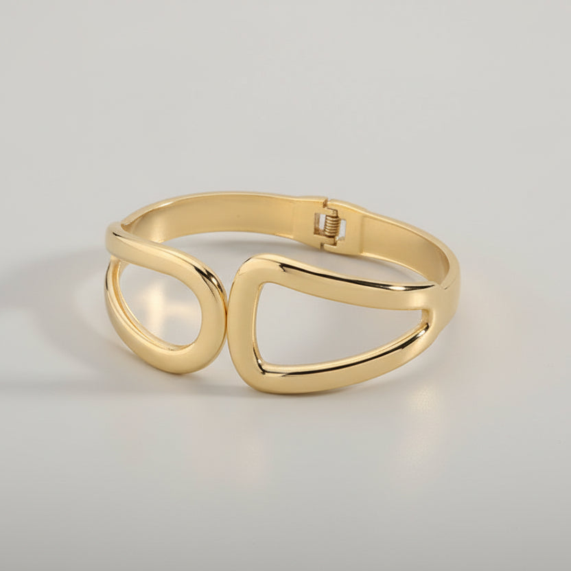 Pulsera rígida con abertura con forma ovalada y hueca acabado oro - Moments by You