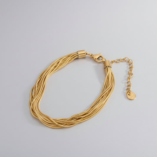 Pulsera acero con múltiples tiras de malla en acabado oro - Moments by You