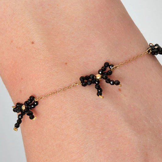 Pulsera de acero inoxidable con tres lazos de cristal de color negro acabado oro - mbyou