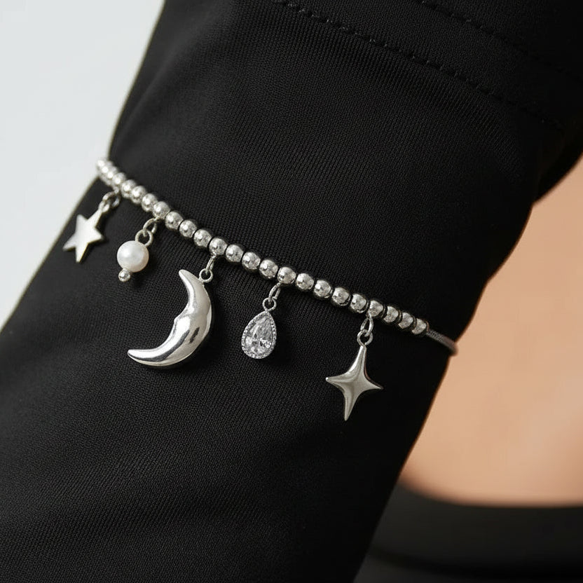 Pulsera de acero con esferas y dijes variados en acabado plata - Moments by You